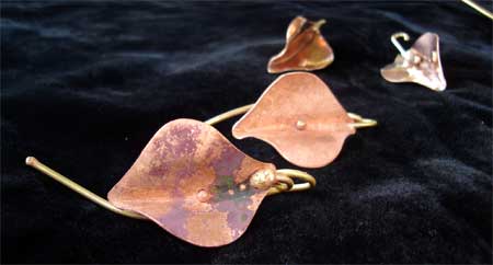 My piÃ¨ce de rÃ©Â·sisÂ·tance for the weekend: the leaf copper earrings.