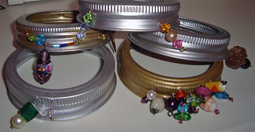 cjbracelets11 My helper got creative and wove wire in and out of the holes, string beads along the way.