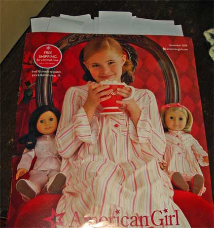 amgrl1 The American Girl Catalog with a multitude of sticky notes spewing out the top.